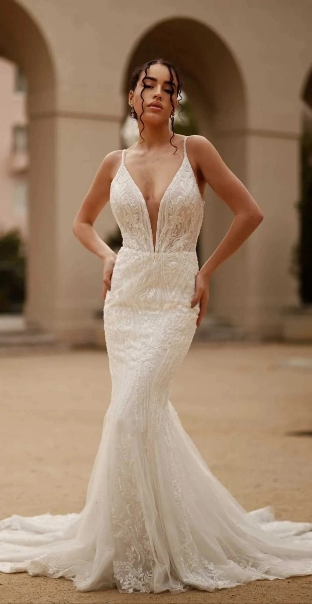 Model wearing a Martina Liana Gown