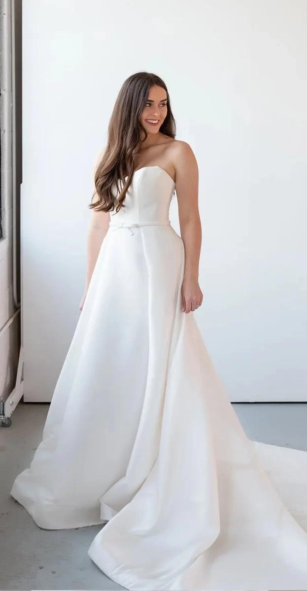 Model wearing a Stella York Gown